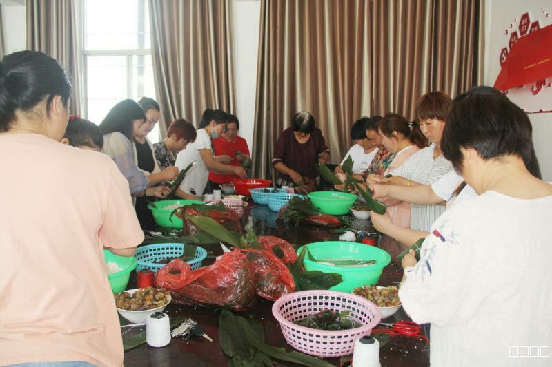 九龙镇新时代文明实践所开展系列活动——“我们的节日·端午节”包粽子比赛