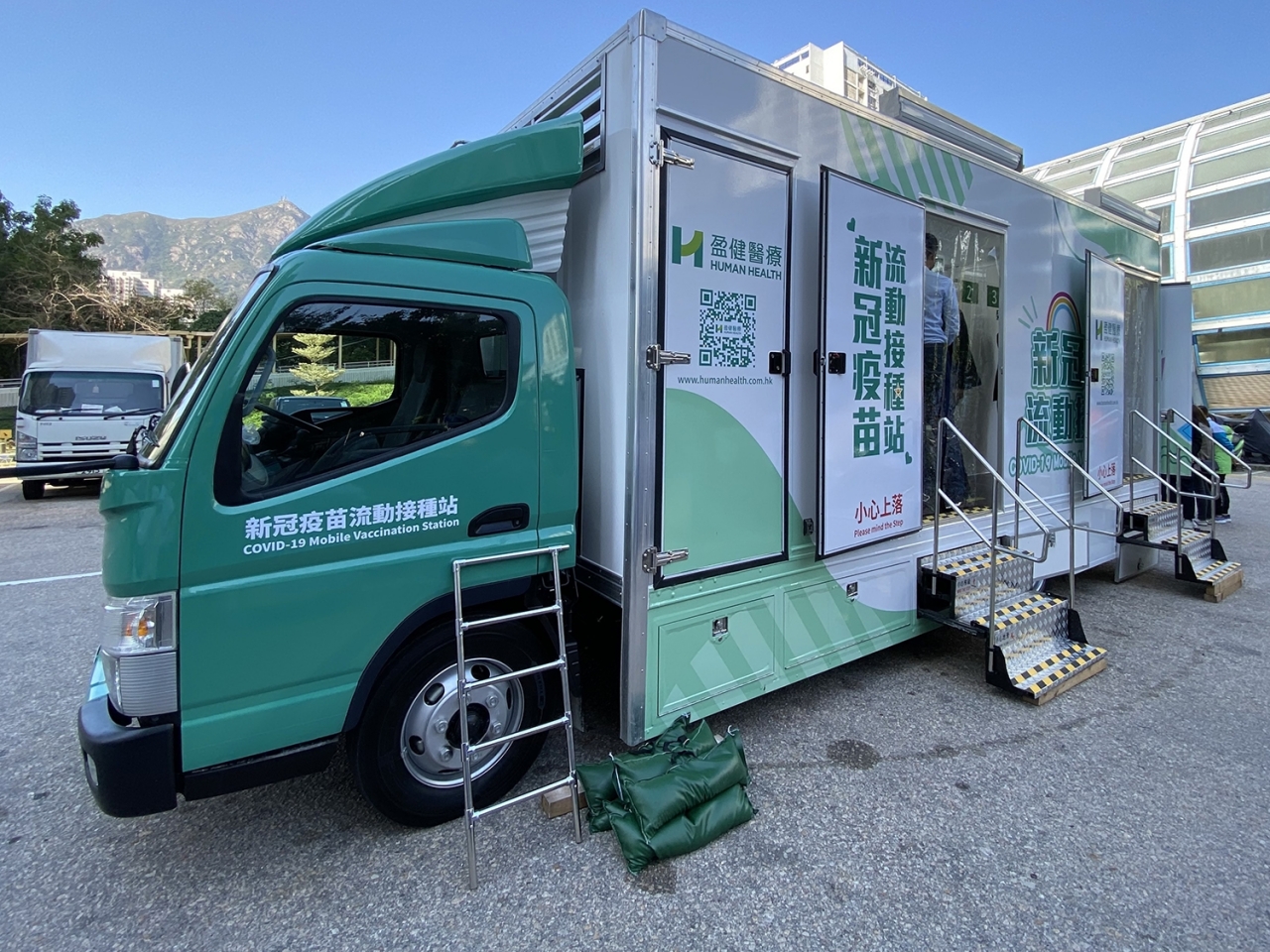 1637988426970467.jpg 公務員事務局表示,市民在接種車的接種流程與在社區疫苗接種中心相同。(政府新聞處).jpg